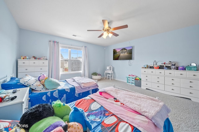 carpeted bedroom with ceiling fan