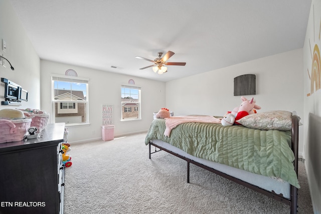 carpeted bedroom featuring ceiling fan