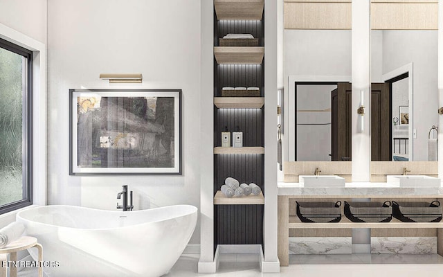 bathroom featuring built in shelves, vanity, a tub to relax in, and a wealth of natural light