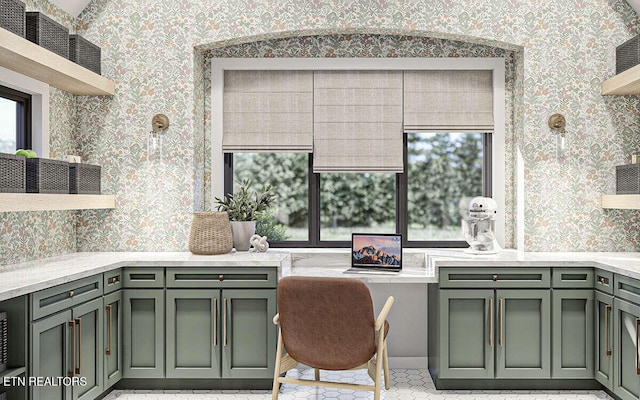 kitchen featuring light tile patterned floors and green cabinetry