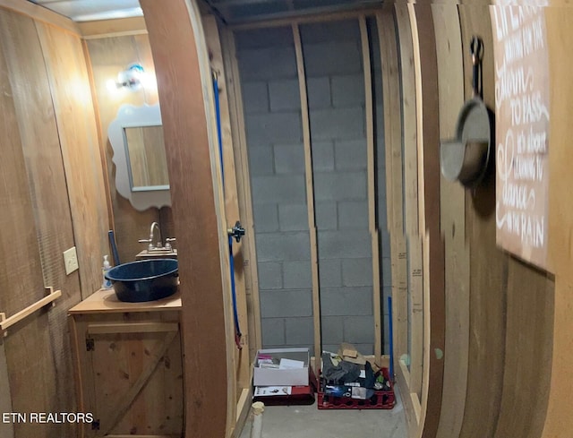 bathroom featuring vanity and concrete floors