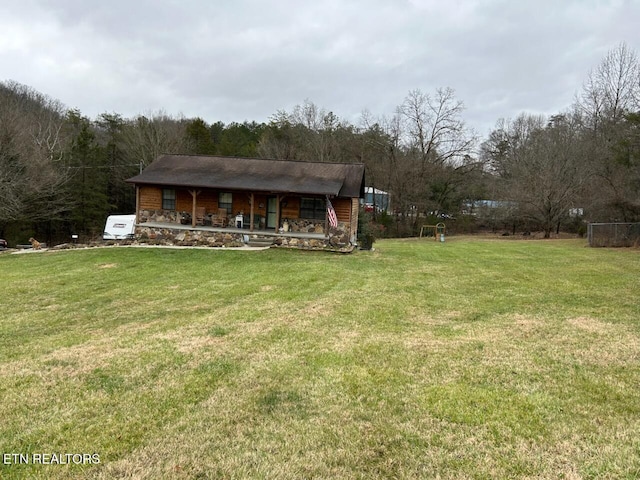 view of yard with a porch