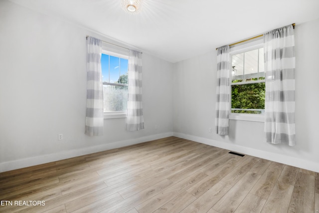 empty room featuring light hardwood / wood-style floors