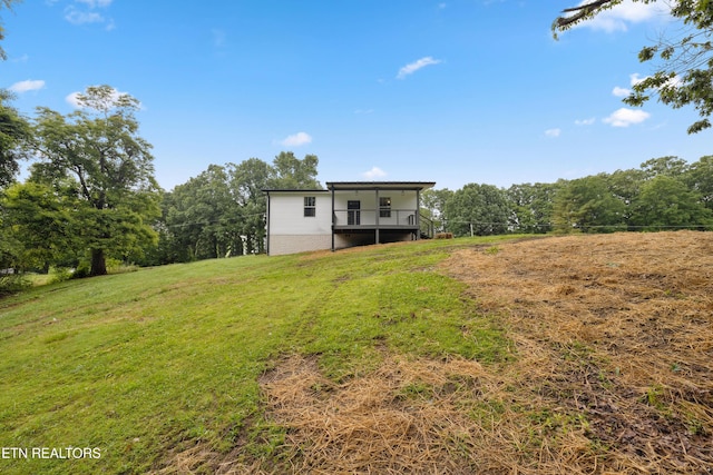 view of yard featuring a deck