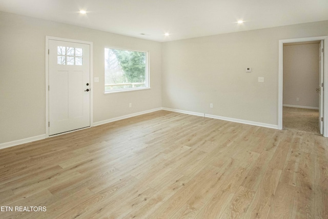 foyer with light hardwood / wood-style flooring