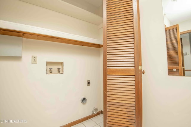 laundry room featuring electric dryer hookup, light tile patterned floors, and hookup for a washing machine