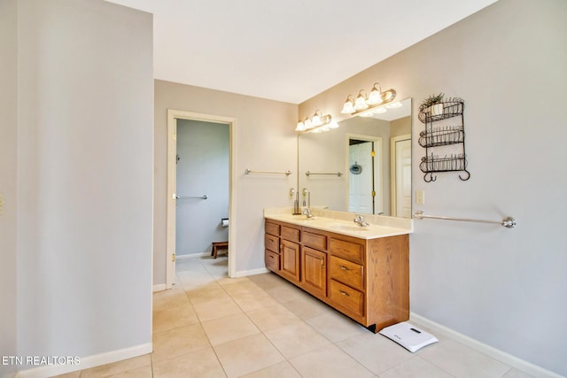 bathroom featuring tile patterned floors and vanity