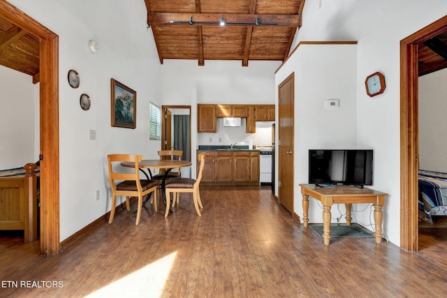 dining room featuring sink, wooden ceiling, beamed ceiling, high vaulted ceiling, and dark hardwood / wood-style floors