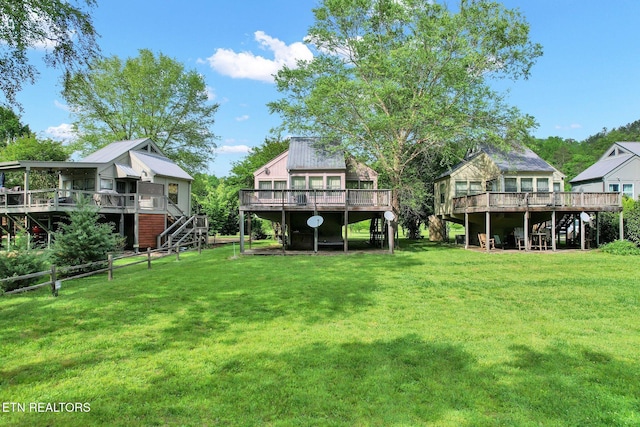 view of yard featuring a wooden deck