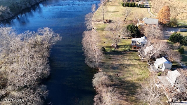 aerial view with a water view and a rural view