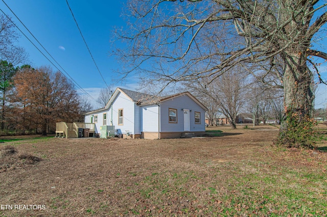 view of home's exterior featuring a yard