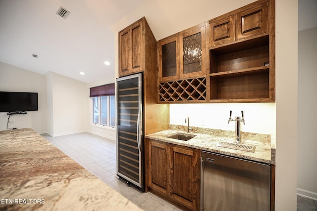 bar with vaulted ceiling, sink, dishwashing machine, wine cooler, and light stone counters