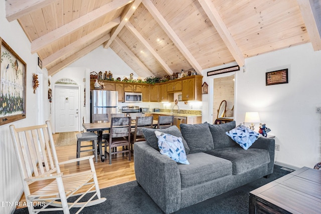 living room with beam ceiling, sink, high vaulted ceiling, wood ceiling, and light wood-type flooring