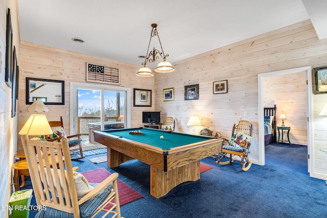 playroom with wood walls, dark carpet, and pool table