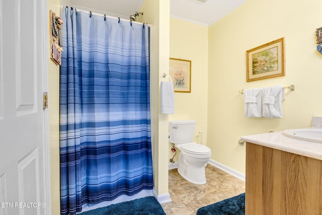 bathroom featuring vanity, tile patterned floors, crown molding, a shower with shower curtain, and toilet