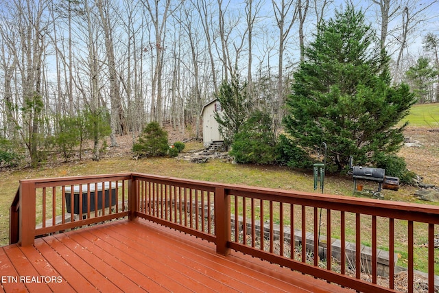 wooden terrace featuring grilling area