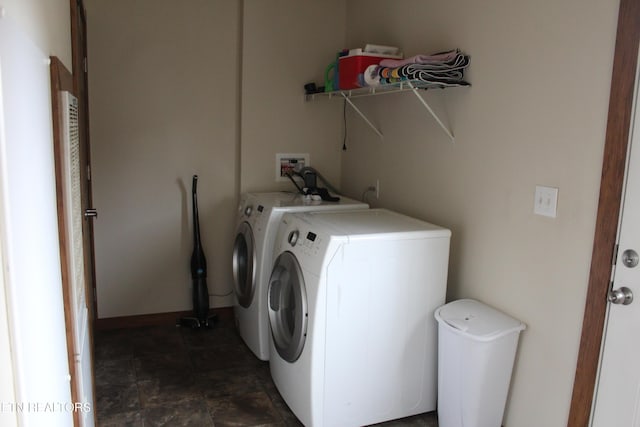 laundry area featuring washing machine and dryer