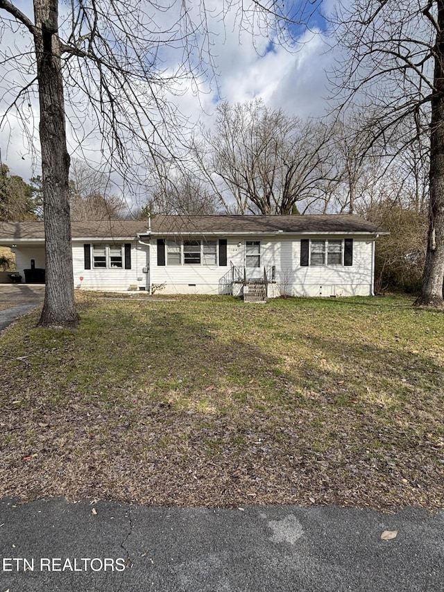 ranch-style house featuring crawl space and a front lawn