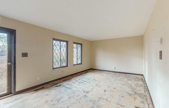 spare room with plenty of natural light