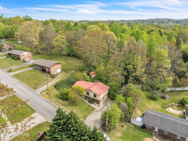 drone / aerial view with a forest view