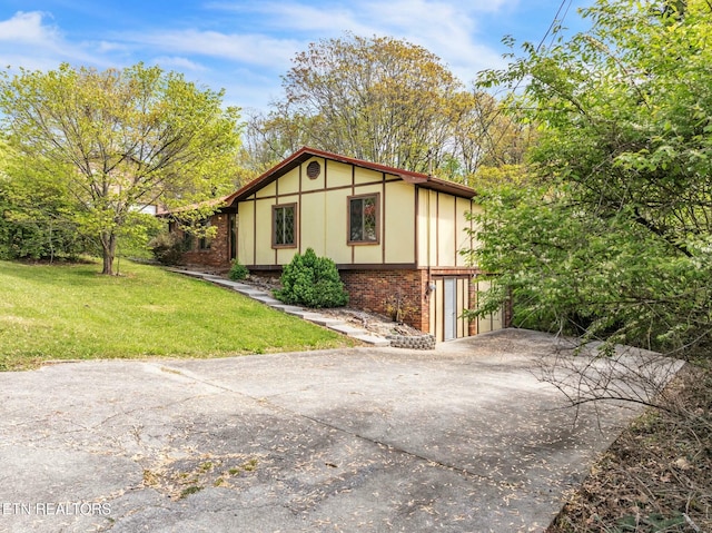 view of outbuilding featuring driveway