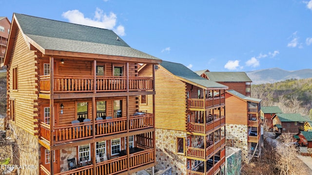 view of building exterior with a mountain view