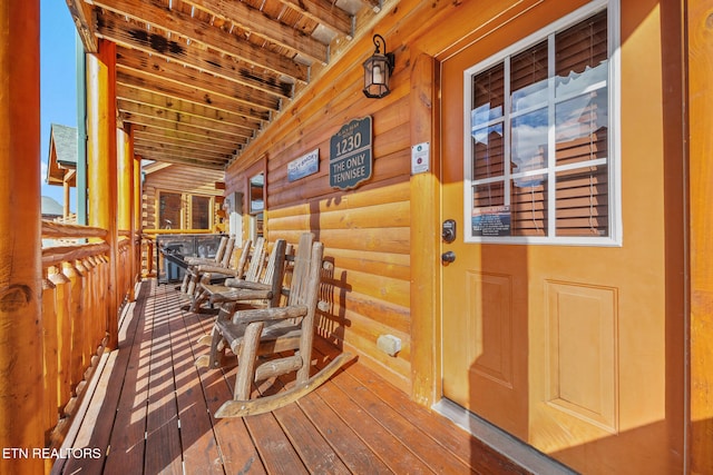 deck featuring covered porch