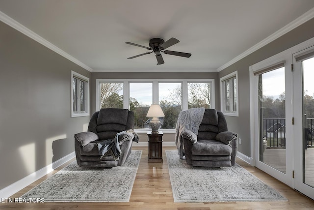 sunroom / solarium with ceiling fan