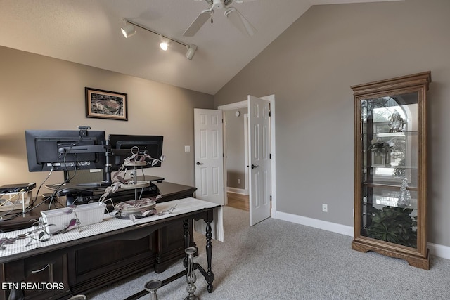 office space featuring light carpet, rail lighting, high vaulted ceiling, and ceiling fan