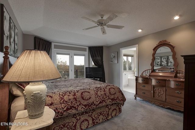 carpeted bedroom with access to outside, connected bathroom, ceiling fan, and a textured ceiling