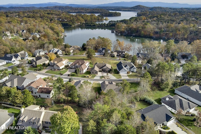 aerial view with a water and mountain view