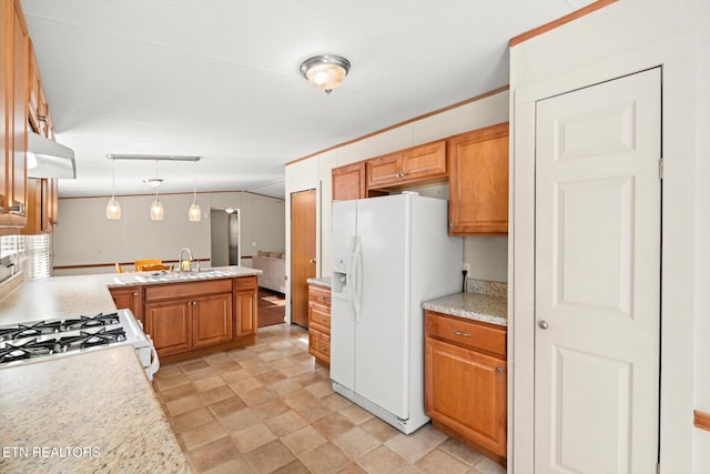 kitchen featuring kitchen peninsula, ornamental molding, white appliances, sink, and hanging light fixtures