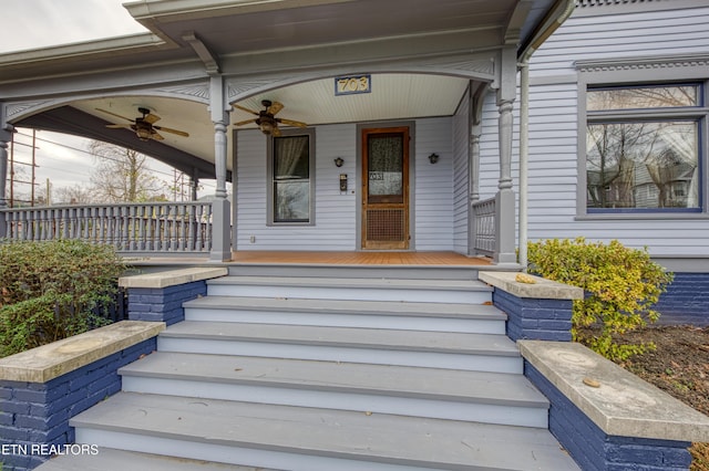 property entrance with ceiling fan and covered porch