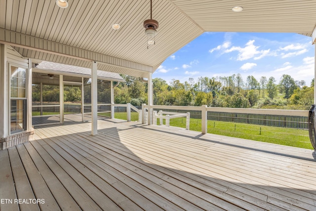 deck featuring a lawn