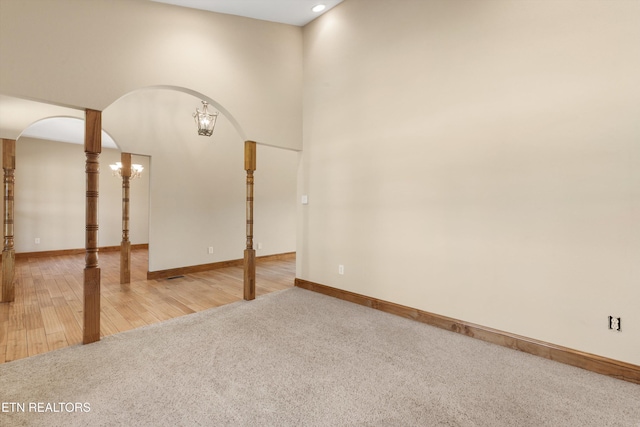 interior space with carpet and a notable chandelier