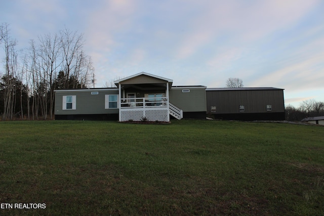 view of front of house with a front lawn