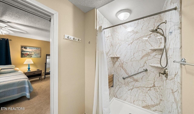 bathroom with a shower with shower curtain, a textured ceiling, and ceiling fan