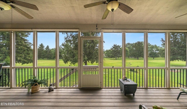 unfurnished sunroom with plenty of natural light