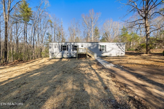 view of front of home with a deck