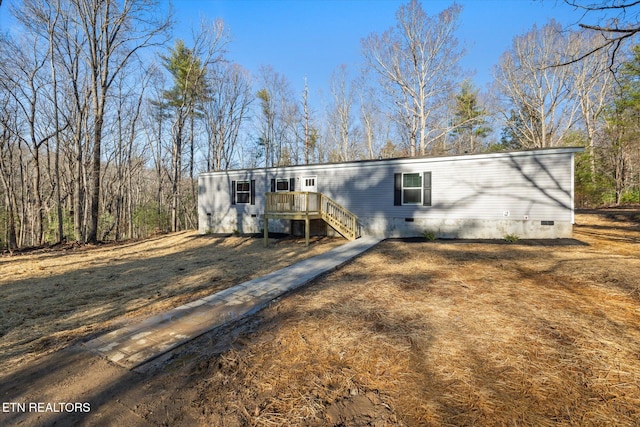 view of front of property with a deck