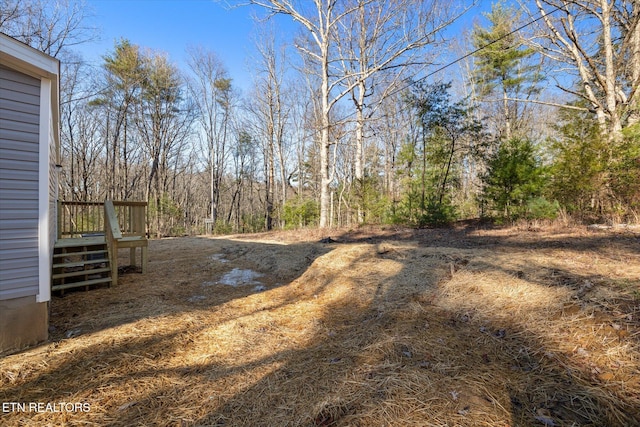 view of yard with a deck