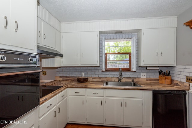 kitchen with sink, a textured ceiling, white cabinetry, backsplash, and black appliances