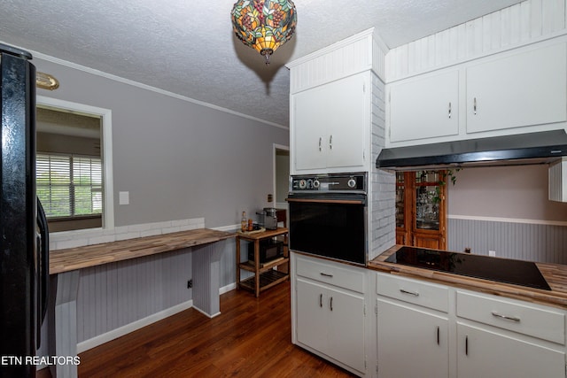 kitchen featuring white cabinets, a textured ceiling, ornamental molding, dark hardwood / wood-style flooring, and black appliances