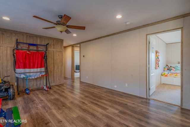 interior space featuring recessed lighting, a ceiling fan, and wood finished floors