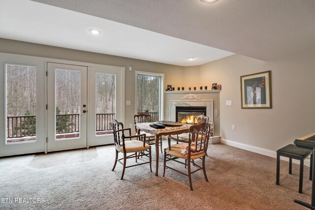 view of carpeted dining space