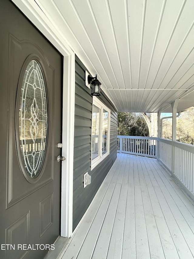 wooden deck with covered porch