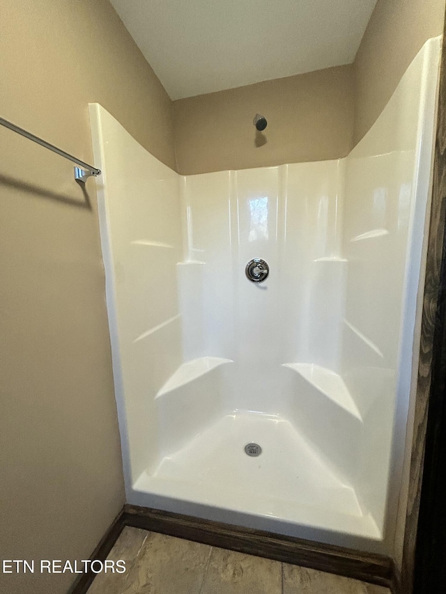 bathroom featuring walk in shower