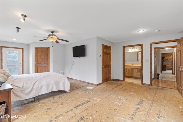 bedroom with ensuite bathroom and ceiling fan