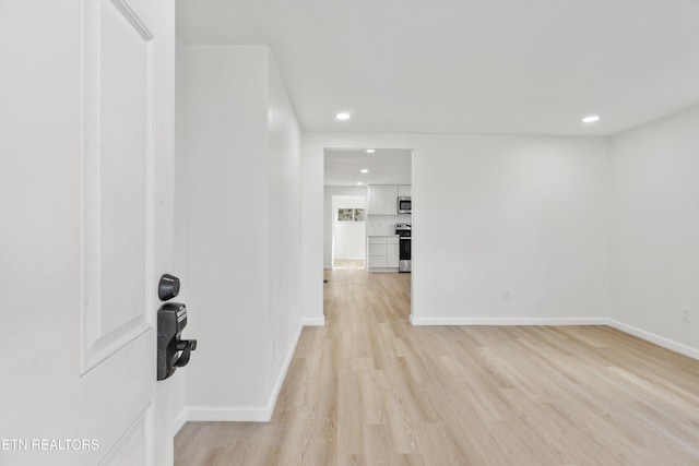 hallway featuring light hardwood / wood-style floors