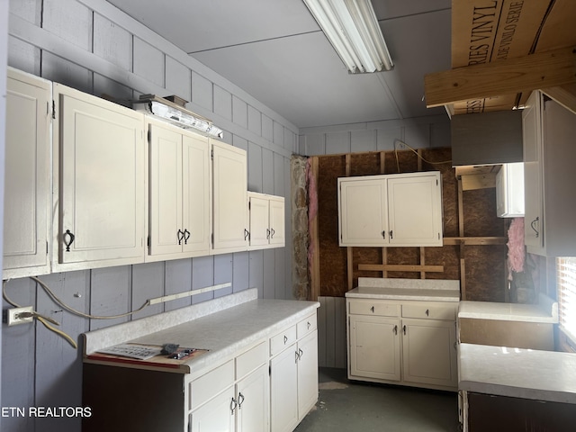 kitchen featuring white cabinets